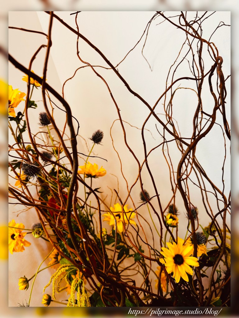 Sunflowers and woody branches